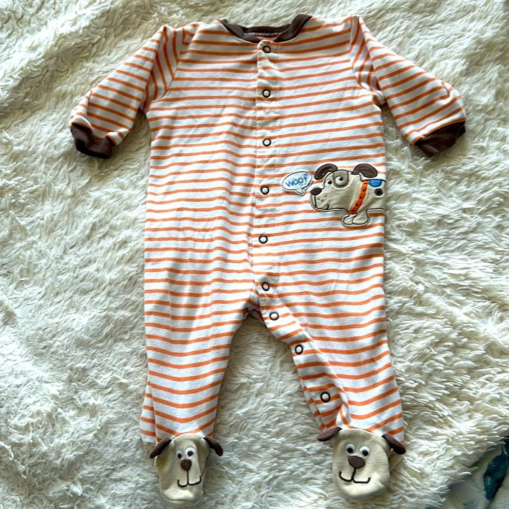 Cute as a button onesie with doggie print
